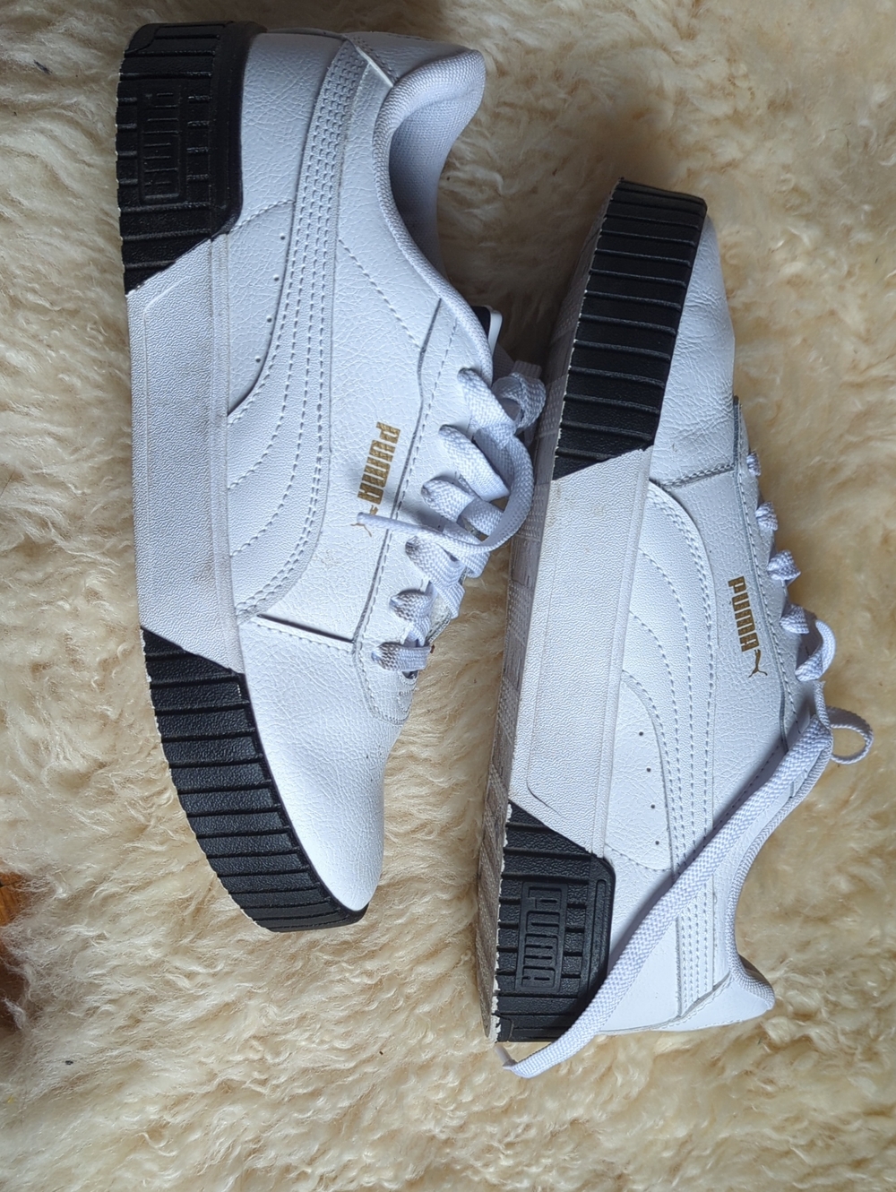 Puma White Leather Sneakers with Black Sole and Gold Logo